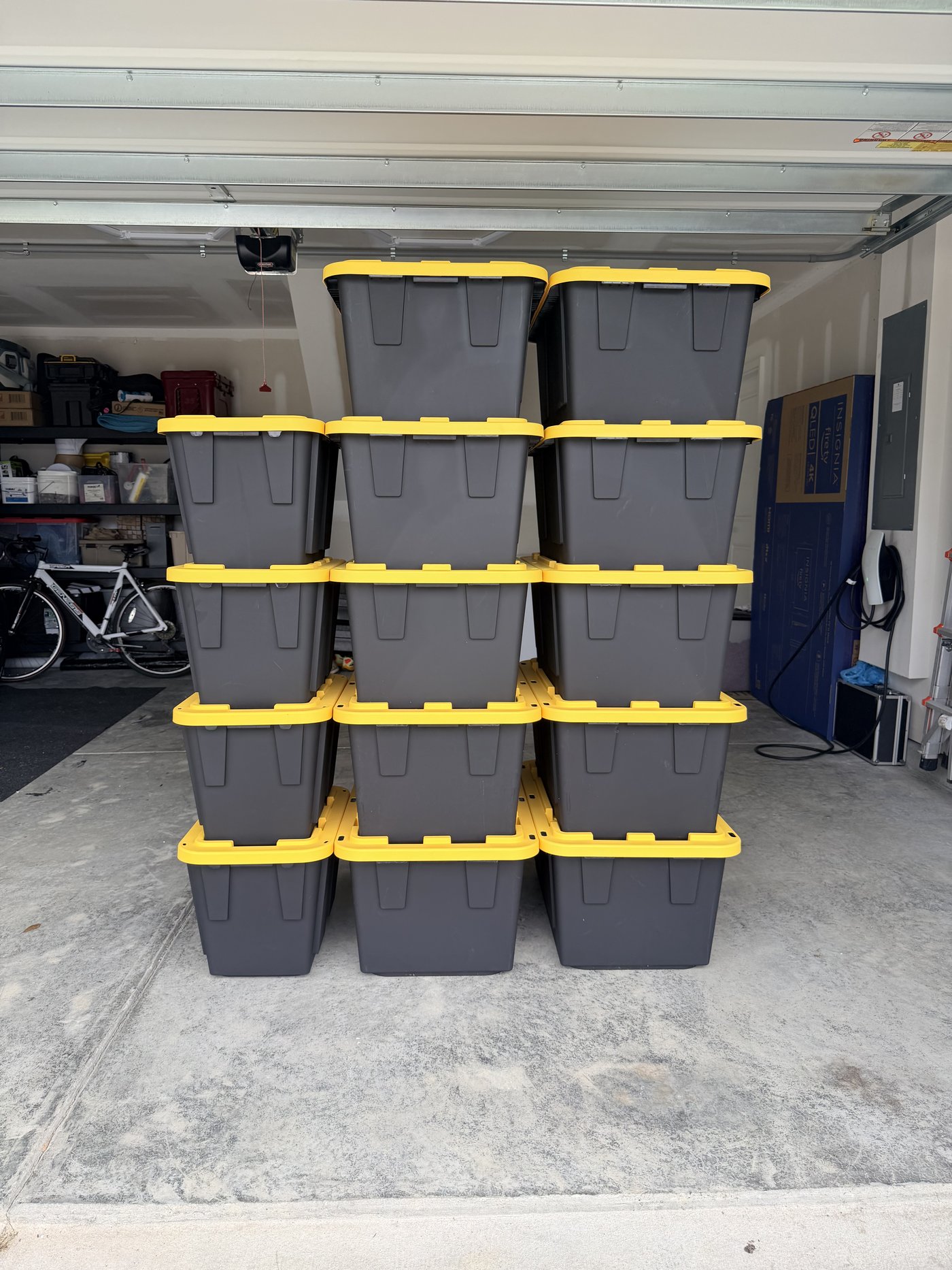 Stacks of Boxtrot moving crates with bright yellow lids, ready for delivery in Charleston, SC